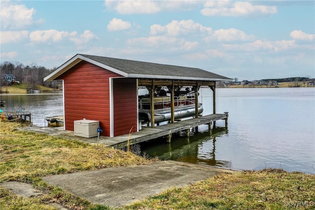 dock area featuring a water view and boat lift