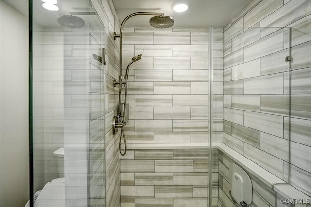 full bathroom featuring a stall shower