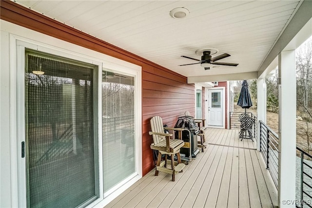 wooden terrace with ceiling fan