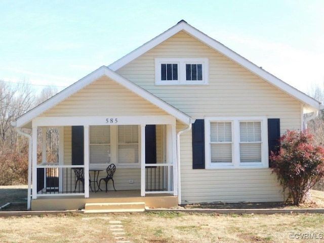 back of house with covered porch