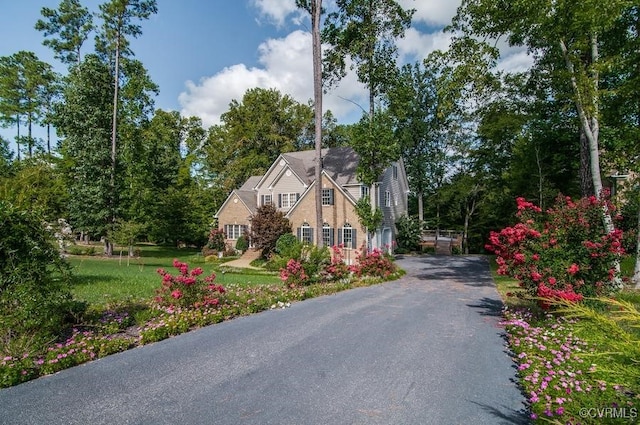 view of road with driveway