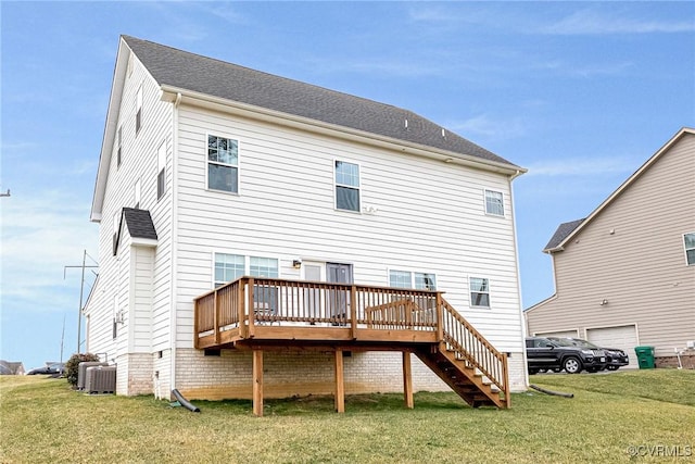 back of house featuring stairs, central air condition unit, a yard, and a wooden deck