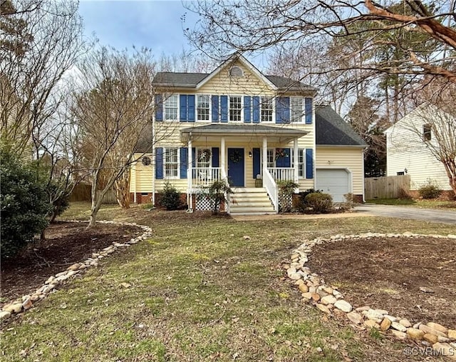 colonial inspired home featuring driveway, crawl space, an attached garage, fence, and a porch