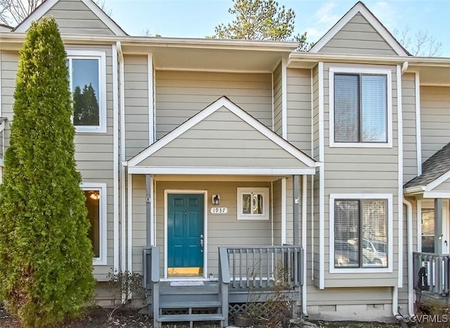 multi unit property featuring crawl space and a porch