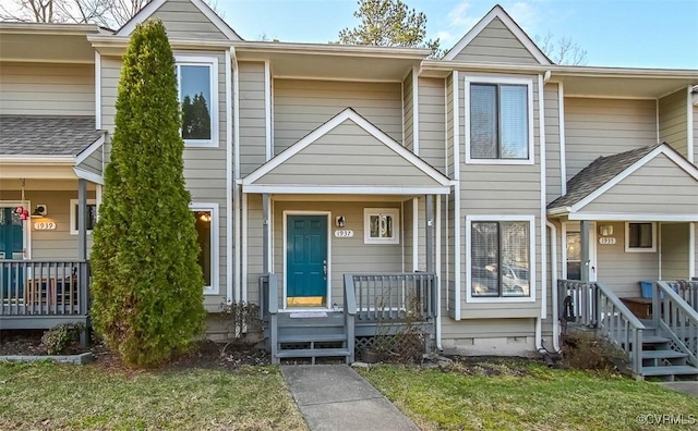 view of property with crawl space and covered porch