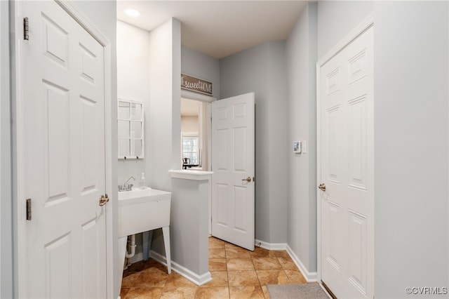 bathroom featuring baseboards