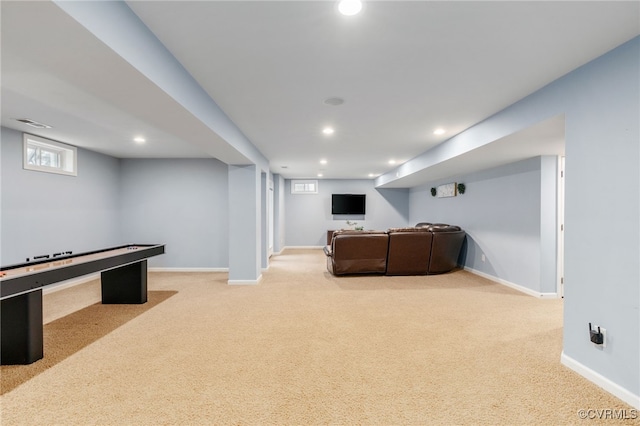 recreation room with baseboards, recessed lighting, and light colored carpet