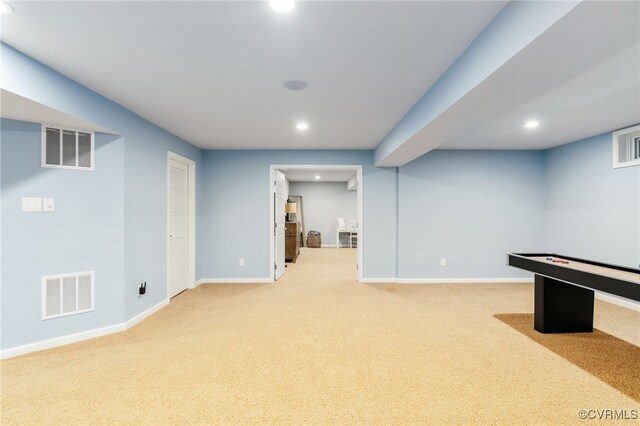 recreation room featuring recessed lighting, light colored carpet, visible vents, and baseboards