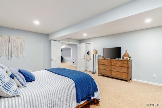 carpeted bedroom with baseboards and recessed lighting