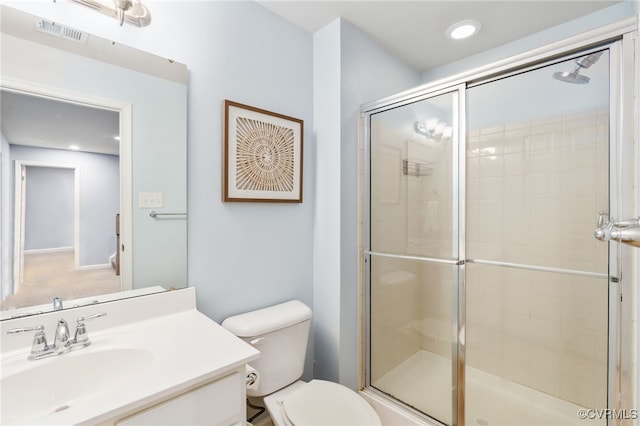 bathroom featuring recessed lighting, visible vents, toilet, a stall shower, and vanity