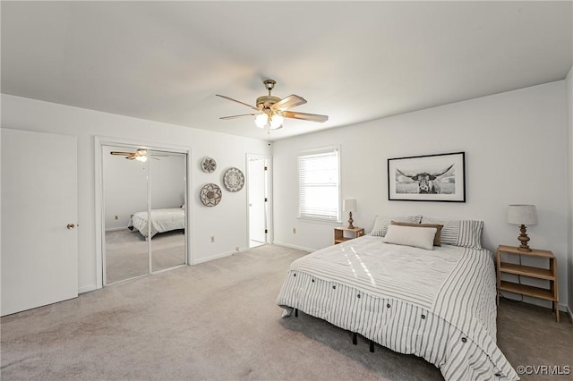 bedroom with baseboards, a ceiling fan, and carpet flooring