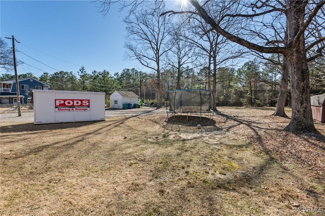 view of yard featuring a trampoline