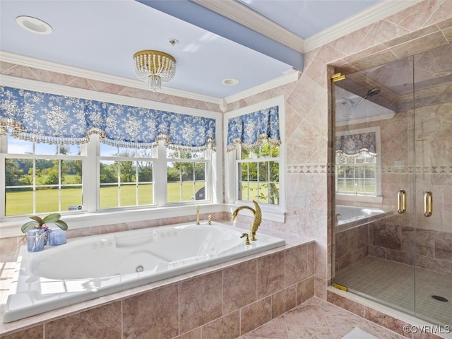 full bath with a stall shower, a tub with jets, and ornamental molding