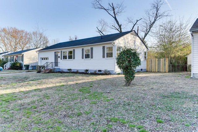 view of front of property featuring fence