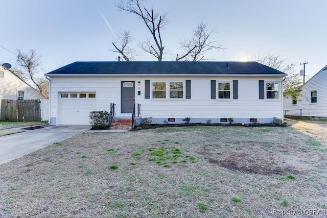 ranch-style home with crawl space, fence, concrete driveway, and an attached garage