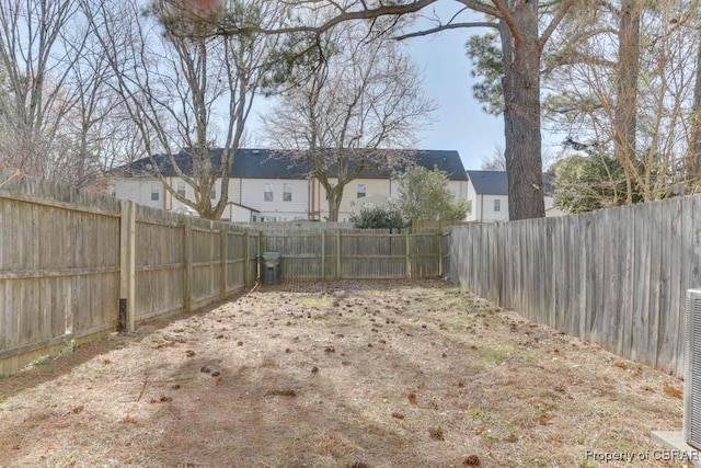 view of yard featuring a fenced backyard