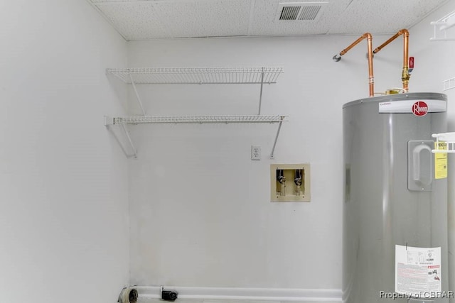 laundry room with washer hookup, laundry area, water heater, and visible vents