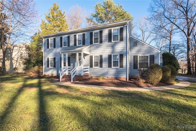 colonial home with a front lawn