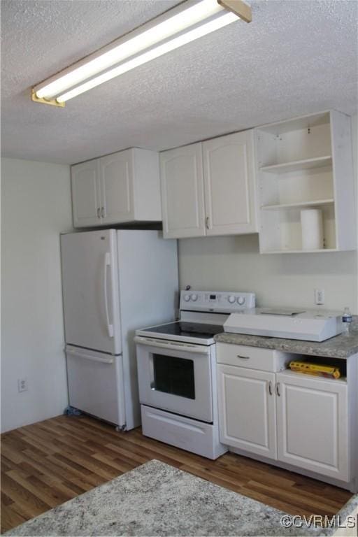 kitchen featuring open shelves, a textured ceiling, wood finished floors, white cabinetry, and white appliances