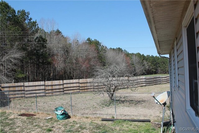 view of yard featuring a fenced backyard