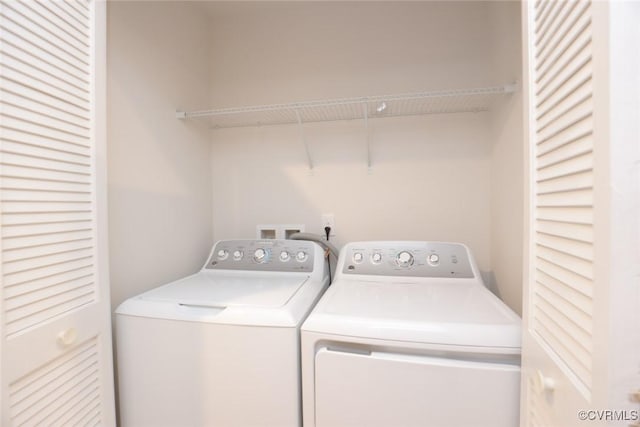 laundry room featuring laundry area and separate washer and dryer