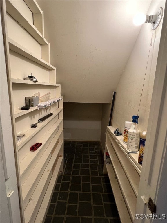 bathroom with lofted ceiling