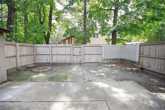 view of yard featuring a fenced backyard and a patio