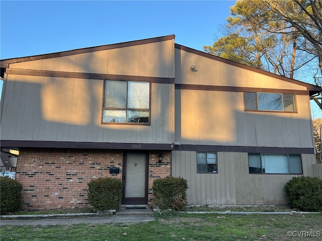 view of front of property with brick siding