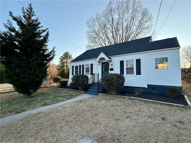 ranch-style house with crawl space and roof with shingles