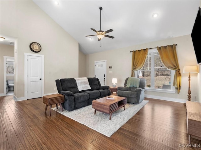 living area with ceiling fan, dark wood-style floors, baseboards, and high vaulted ceiling