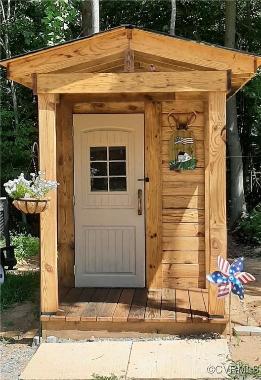 view of outbuilding featuring an outdoor structure