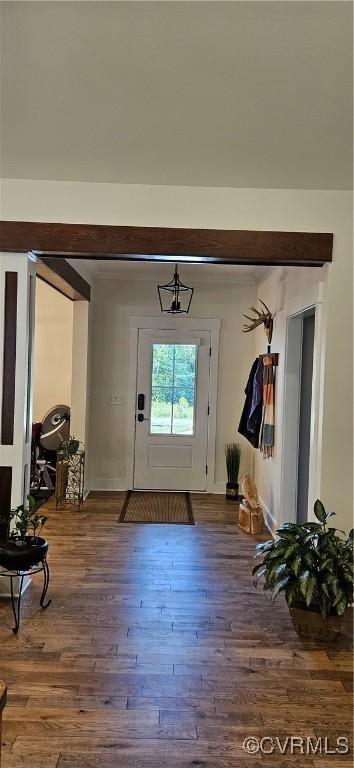 foyer with wood finished floors