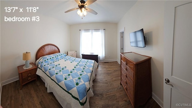 bedroom featuring dark wood-style flooring, baseboards, and vaulted ceiling