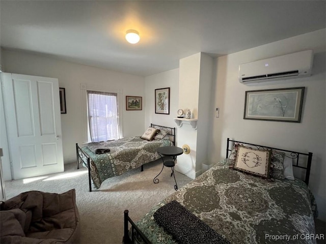 bedroom with a wall unit AC and carpet floors