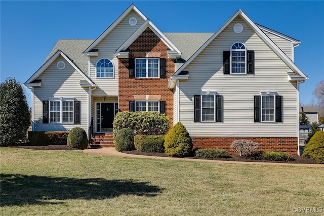 traditional home with a front lawn