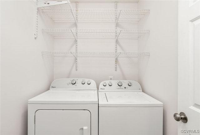 laundry room featuring laundry area and separate washer and dryer