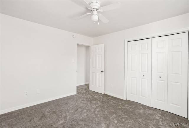 unfurnished bedroom with a closet, carpet flooring, a ceiling fan, and baseboards