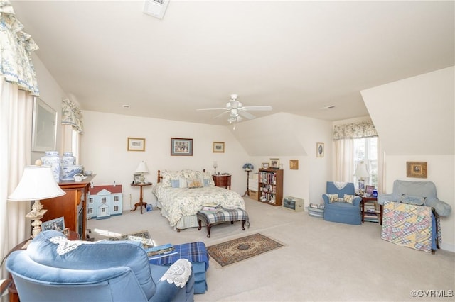 bedroom featuring vaulted ceiling, ceiling fan, carpet flooring, and visible vents