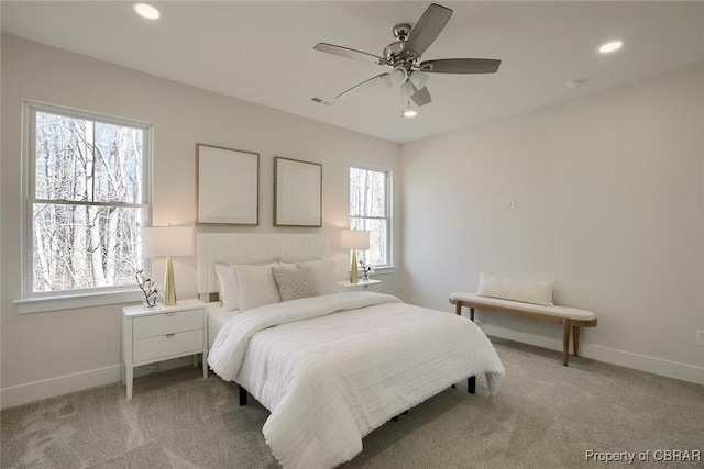 bedroom with recessed lighting, carpet flooring, and baseboards