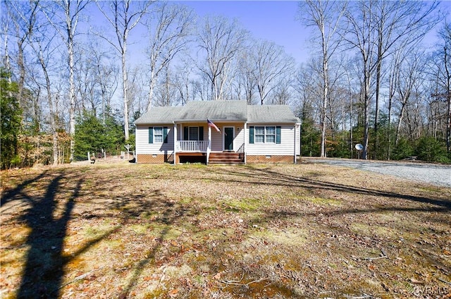 view of front facade featuring crawl space and covered porch