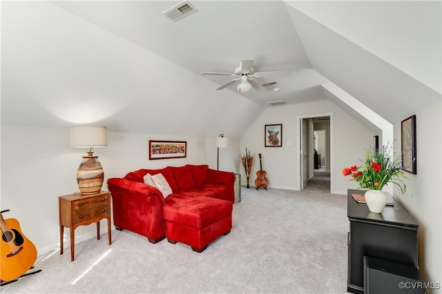 living area featuring visible vents, baseboards, ceiling fan, carpet, and vaulted ceiling