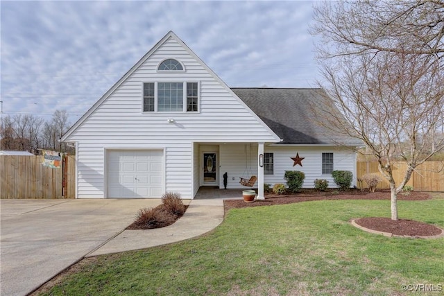 traditional home with a front yard, fence, a porch, concrete driveway, and a garage