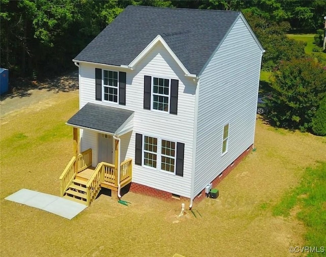 view of front of home featuring crawl space and roof with shingles