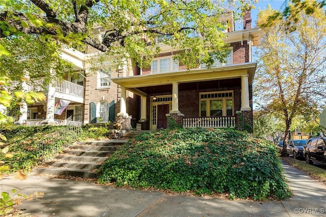 view of front of home with brick siding