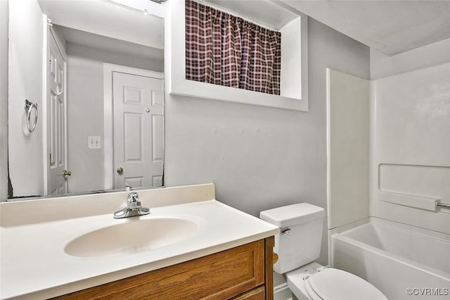 full bath with washtub / shower combination, vanity, and toilet