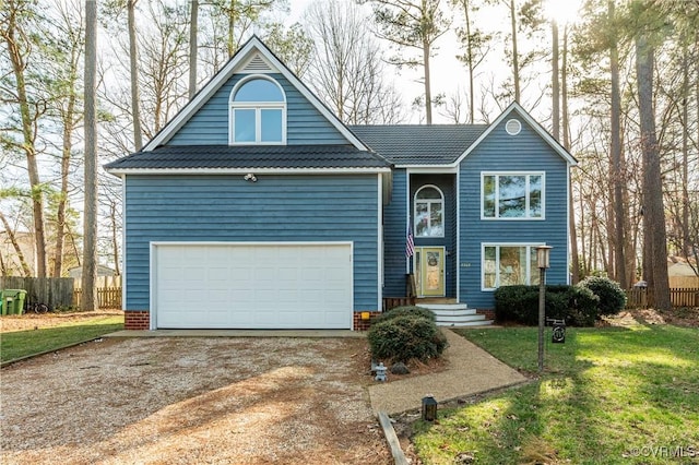 view of front facade with a front yard, fence, a garage, and dirt driveway