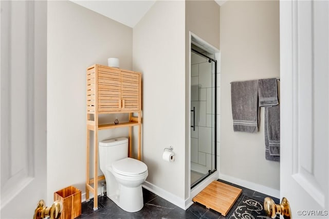 full bathroom featuring baseboards, toilet, a shower stall, and tile patterned flooring