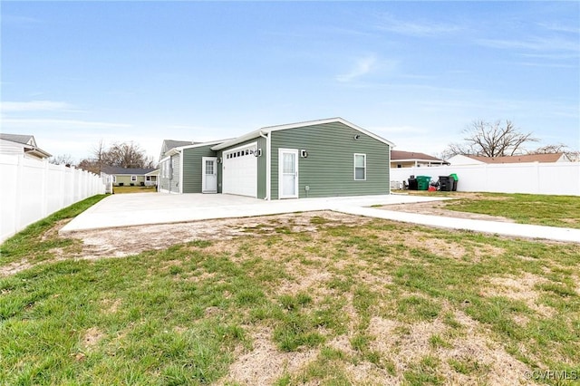 exterior space with driveway and fence