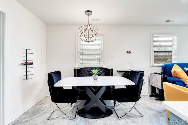 dining area with visible vents, baseboards, a notable chandelier, and marble finish floor