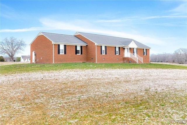 single story home with crawl space, brick siding, and a front lawn